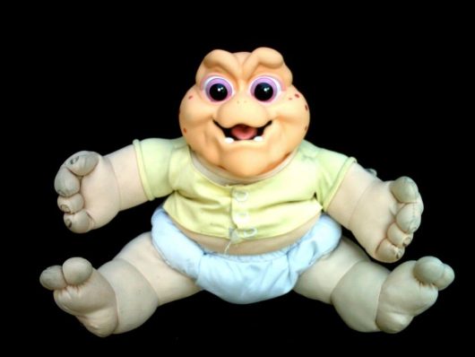 Boneco Baby da Família dinossauros que fala anos 90